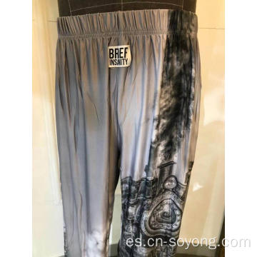 Pantalones con parte inferior de salón estampados colocados para hombre